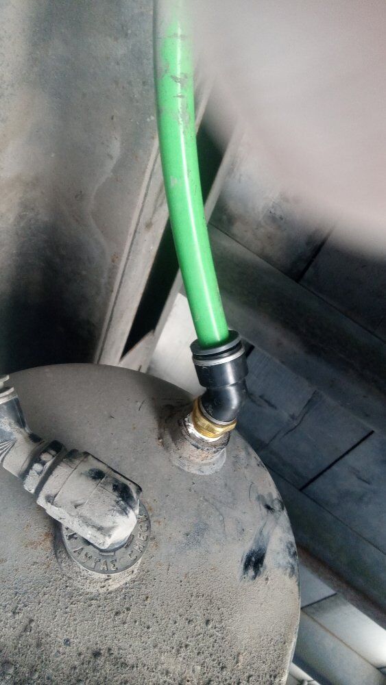 Fuel or DEF line connected during a heavy-duty engine service