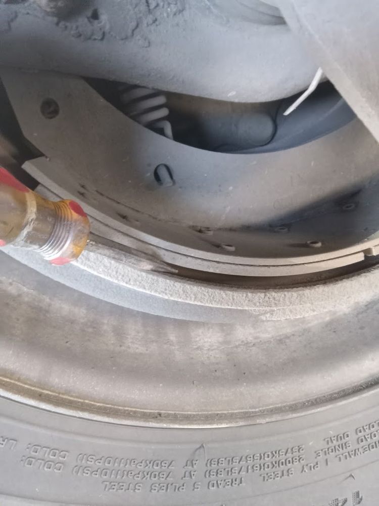 Wheel and brake assembly viewed close up during a tire and brake service