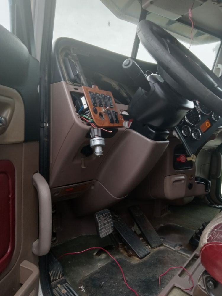 Cab dash panel opened for electrical and wiring troubleshooting