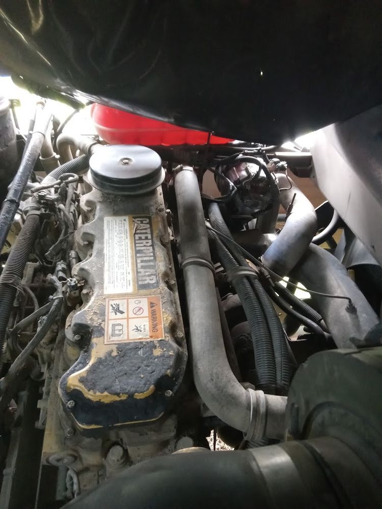 Caterpillar diesel engine bay opened for repair